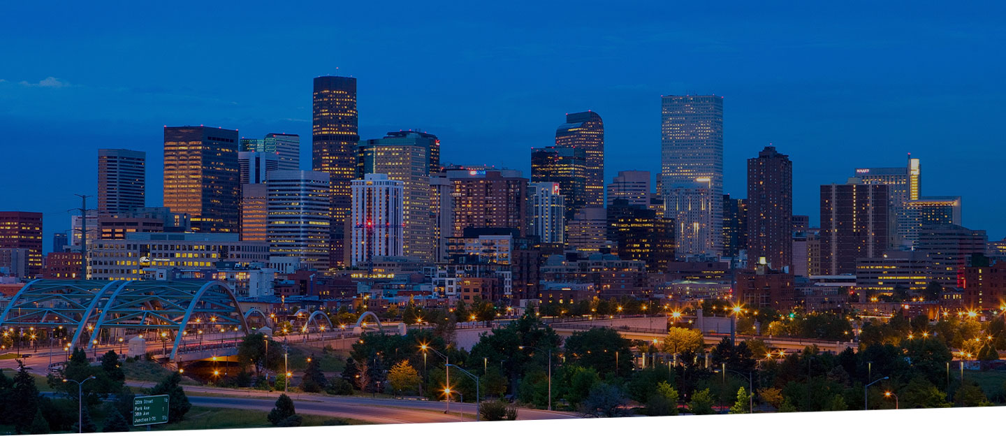 City skyline of downtown Denver at night.