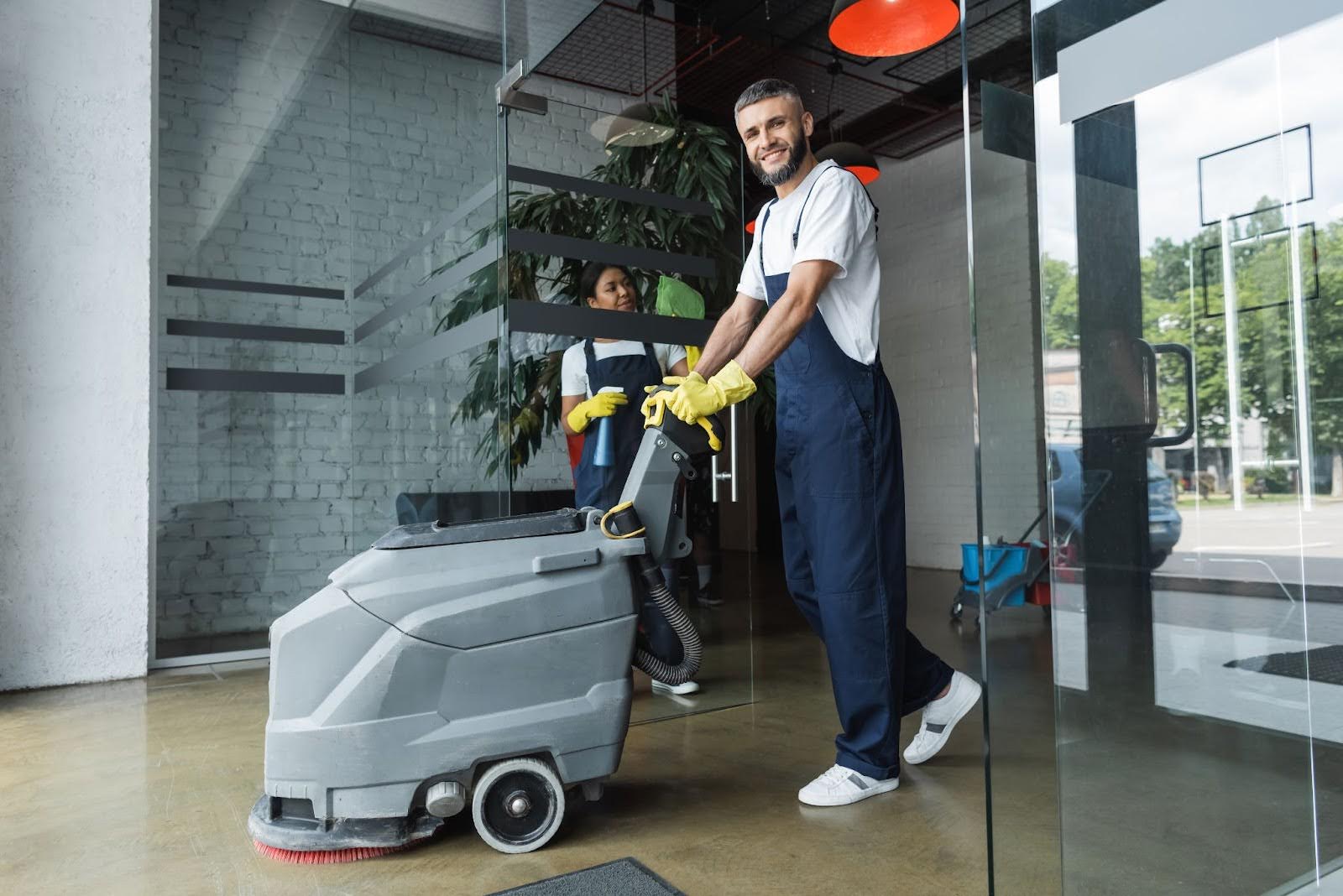 Man Scrubbing Floor with machine